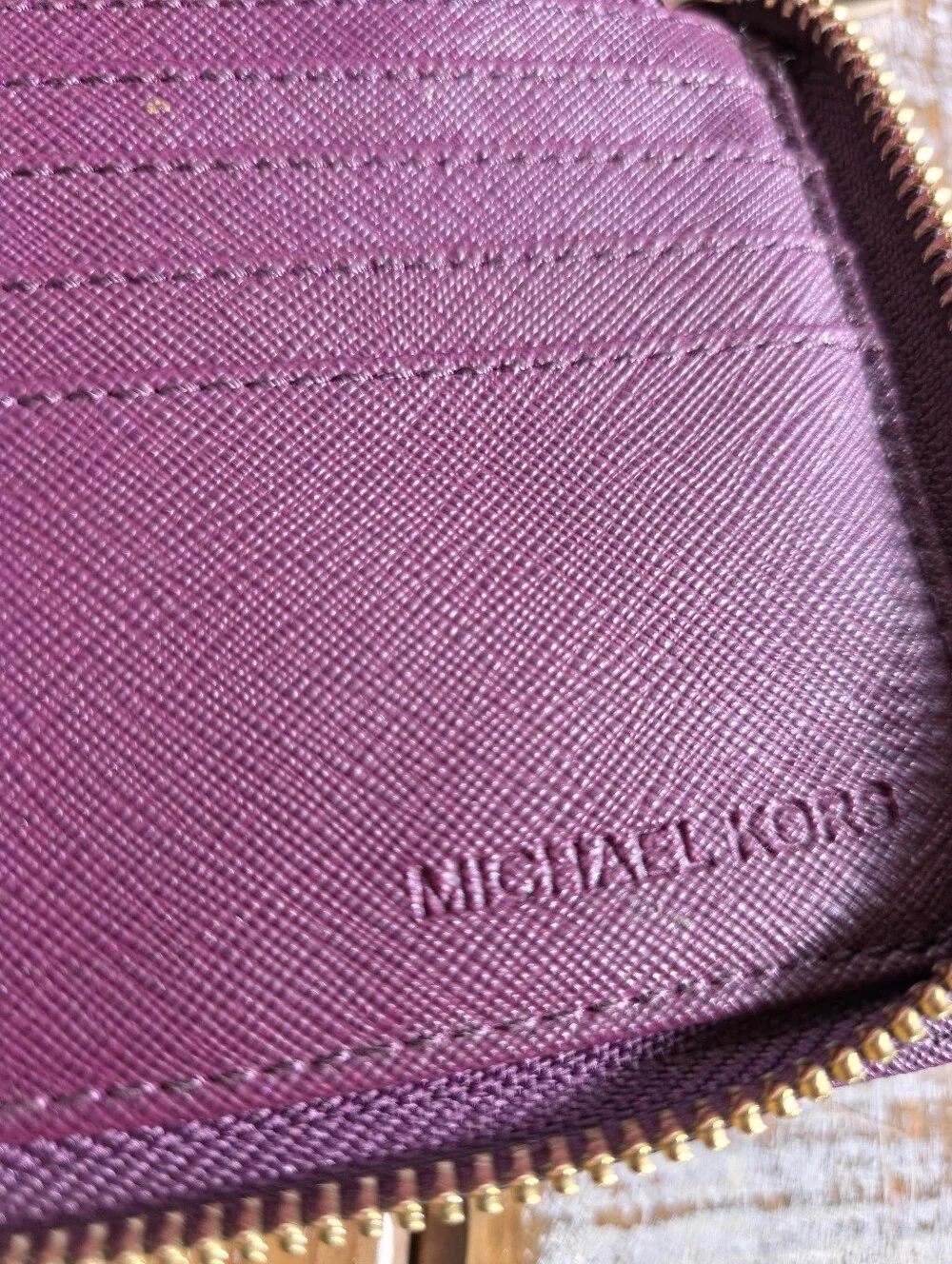 Michael Kors Plum Saffiano Zip Around Wallet with Gold Hardware